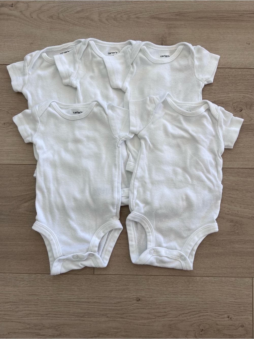 5 Carters Bodysuits